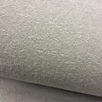 Muovitettu frotee beige